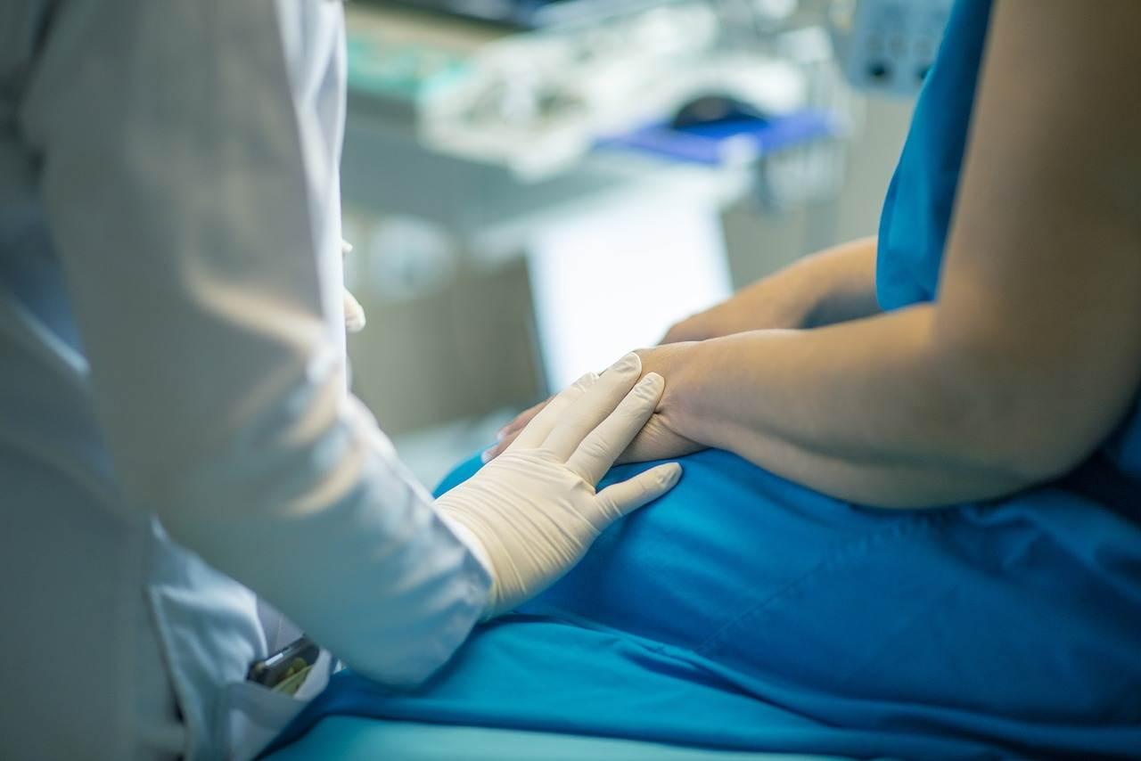 A nurse cares for a patient